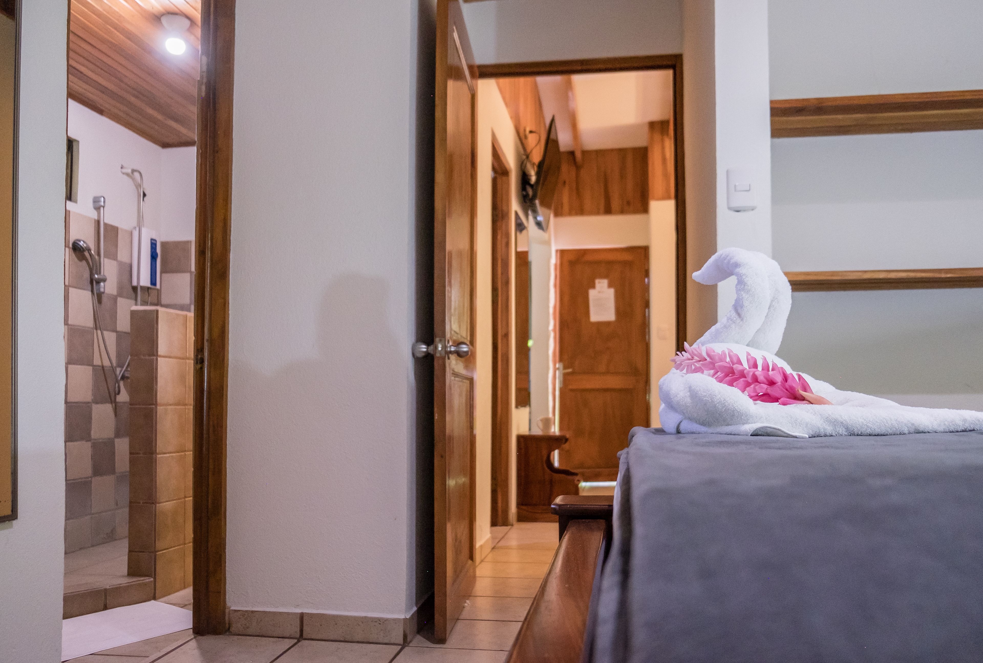 junior bungalow, 2 bedrooms, pool view, garden area | 1 bedroom, in-room safe, free cots/infant beds, free wifi