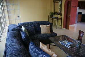Deluxe Apartment, 1 Bedroom, Non Smoking | Living room | Flat-screen TV - Corail Suites (Petionville)