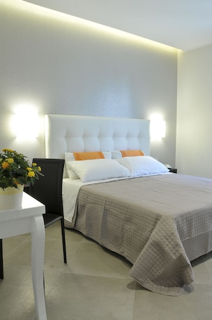 Premium bedding, in-room safe, desk, soundproofing