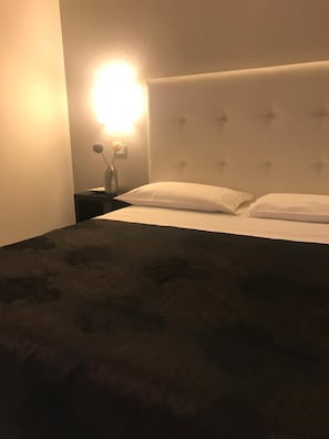 Premium bedding, in-room safe, desk, soundproofing