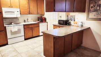 Premier Room, 3 Bedrooms | Private kitchen | Full-size fridge, microwave, coffee/tea maker
