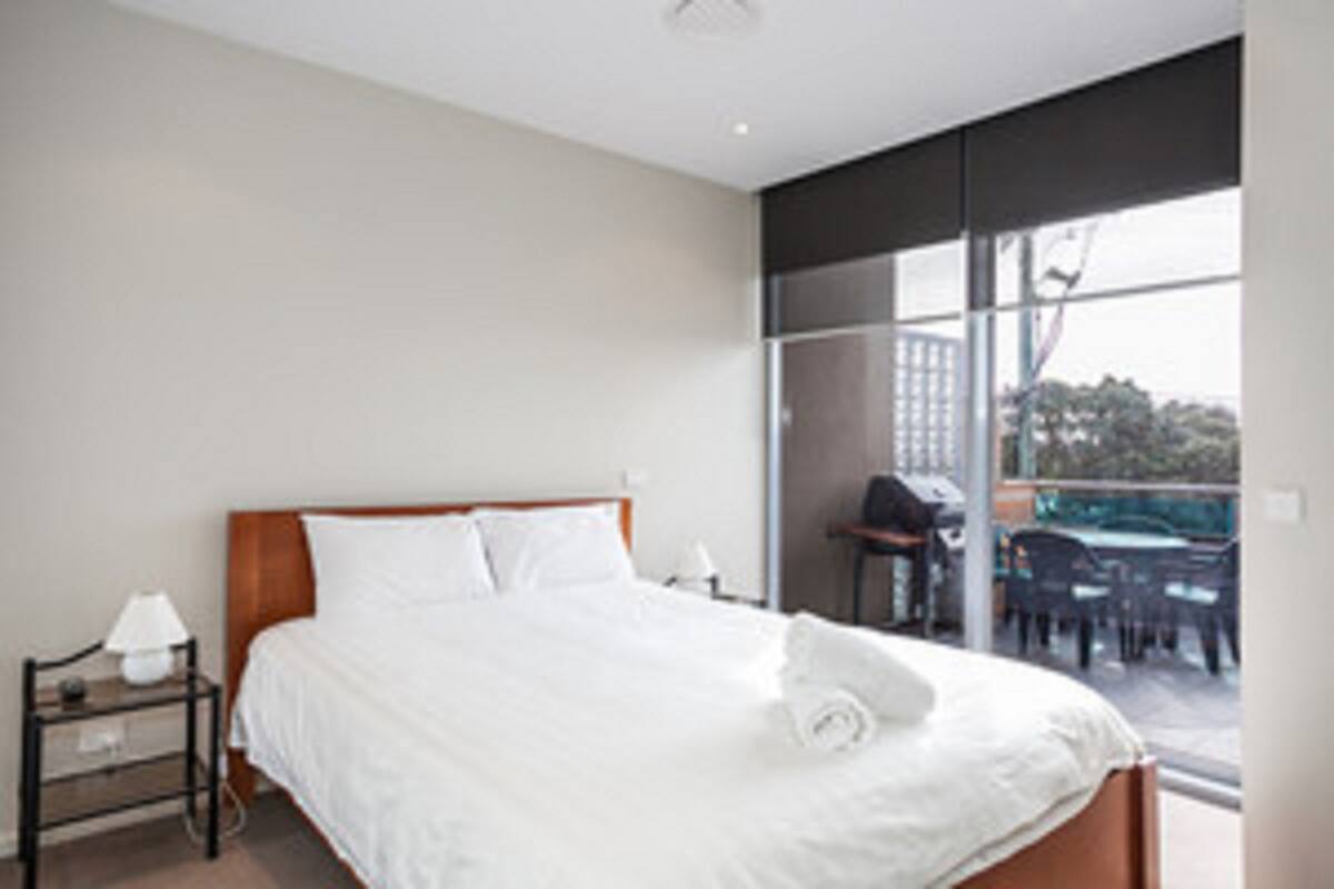 Standard Penthouse, 2 Bedrooms (Apt 10 ) | Blackout drapes, iron/ironing board, individually decorated