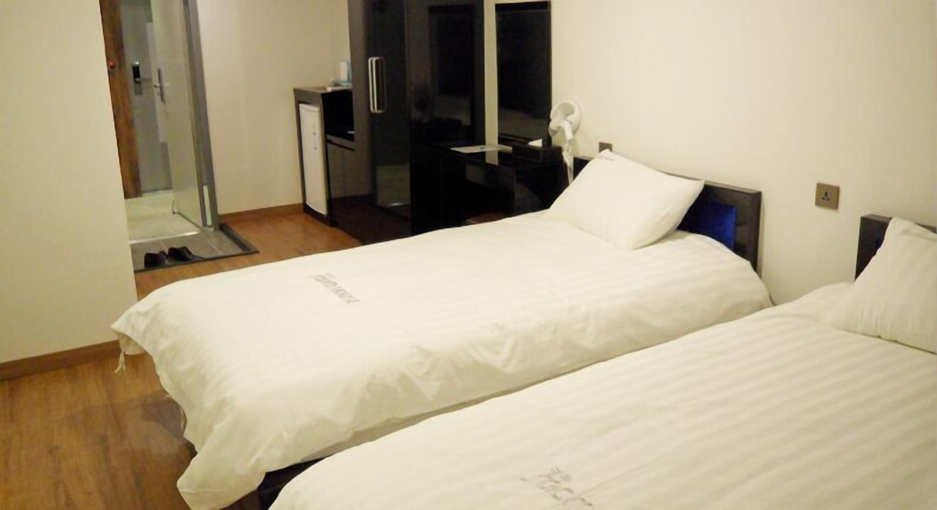 Desk, free WiFi, bed sheets