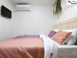 Habitación Premier con 2 camas individuales | Escritorio, cortinas blackout y tabla de planchar con plancha 