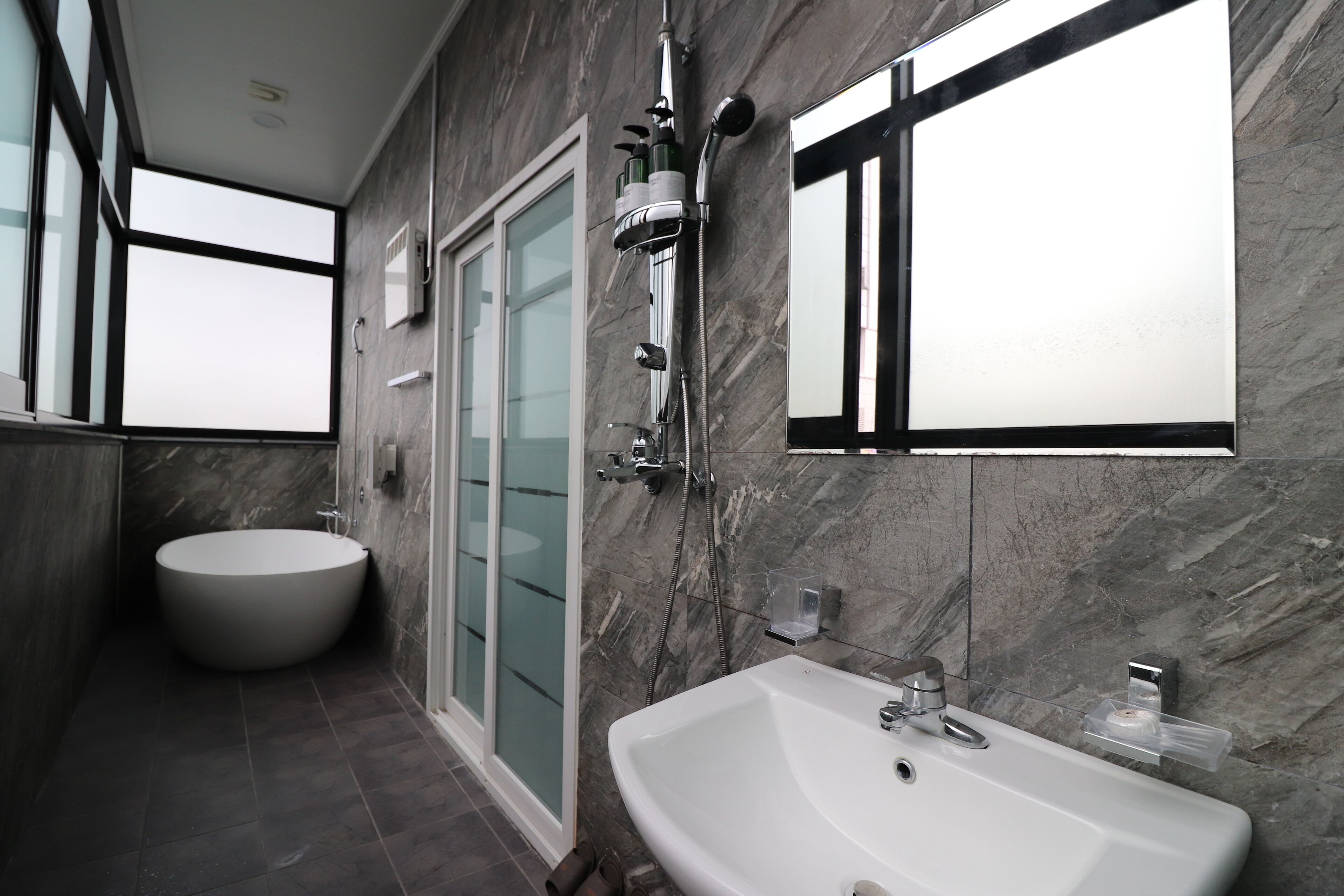 superior twin room | bathroom | separate bathtub and shower, jetted bath, free toiletries, hair dryer