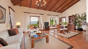 Luxury Suite, 1 King Bed, Ensuite, Sea View | Living area | Flat-screen TV - Bellavista Country Place (Stanford)