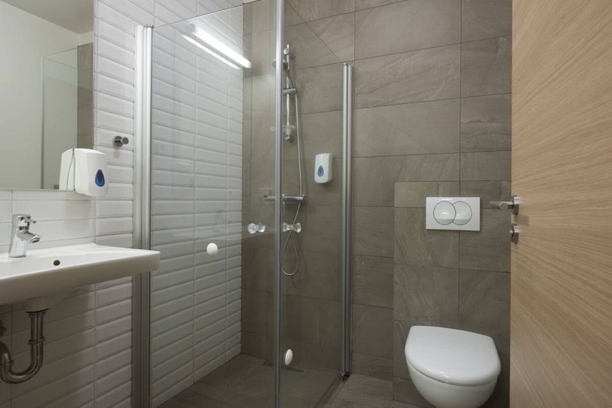 superior double or twin room | bathroom | shower, hair dryer, towels