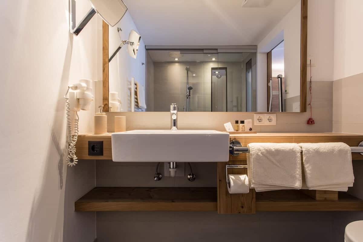 hair dryer, dressing gowns, towels, soap