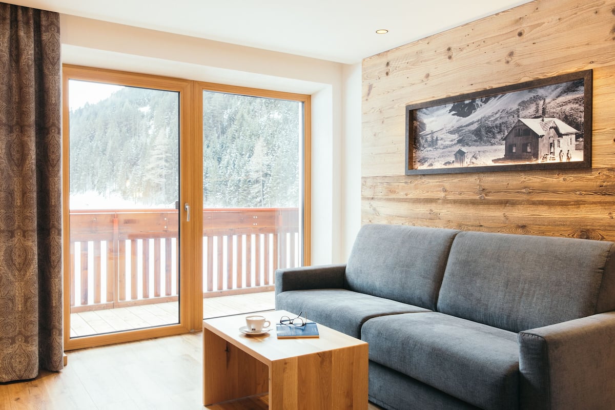 comfort double room | living area | flat-screen tv, heated floors