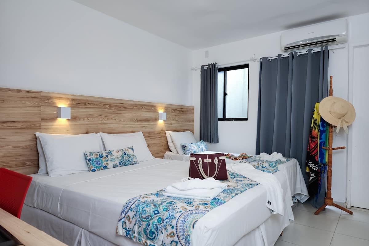 Standard Triple Room | Desk, blackout drapes, iron/ironing board, free WiFi