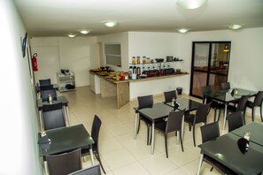 Enjoy meals in this well-designed dining area with a central island and comfortable seating for both solo and group dining.