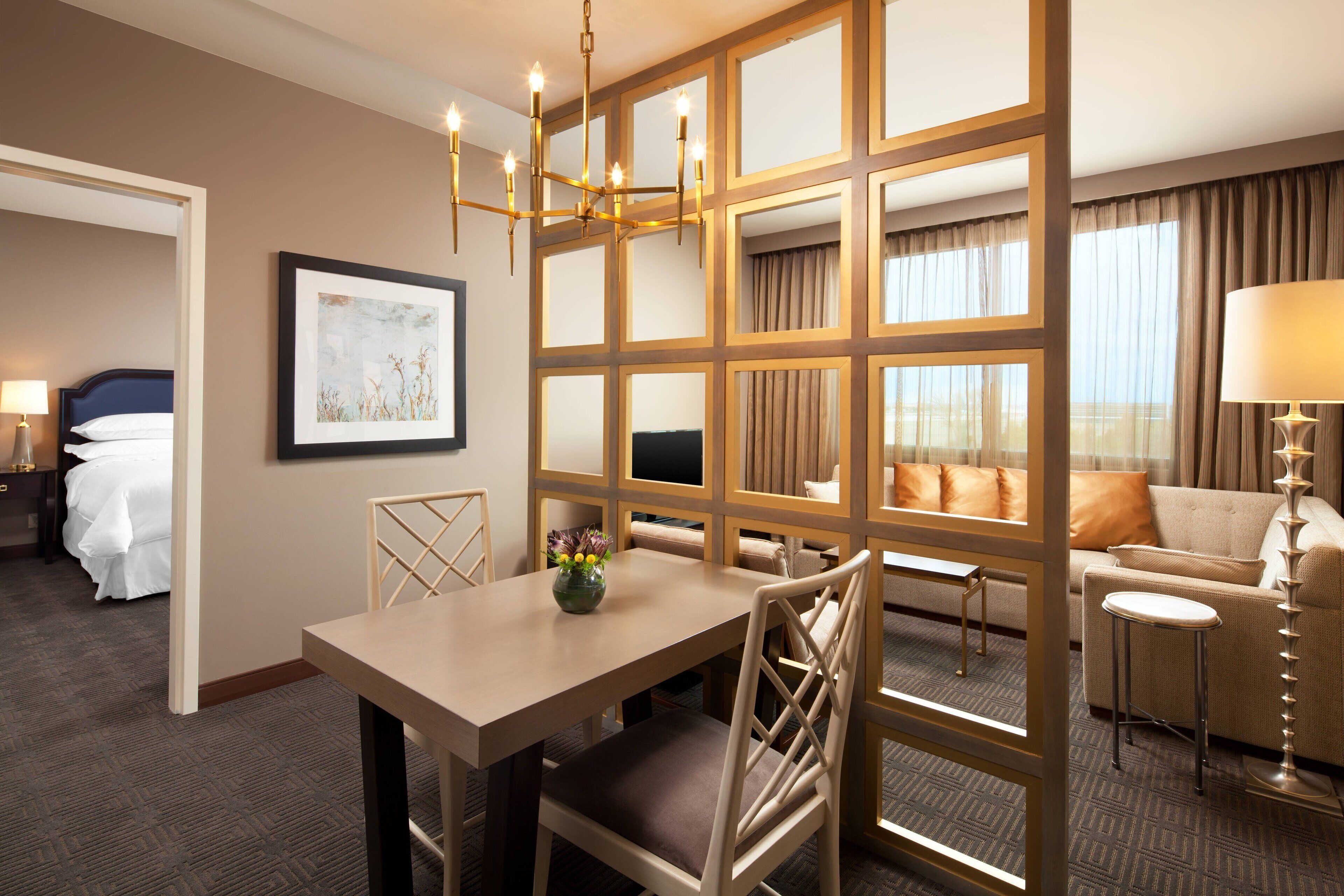 hypo-allergenic bedding, down duvets, in-room safe, desk