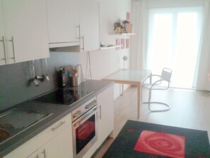 City Studio, 1 Queen Bed, Accessible, Ground Floor | Private kitchen | Fridge, microwave, oven, stovetop - Quartier Hostel Potsdam (Potsdam)