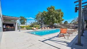 Outdoor pool, free cabanas, pool umbrellas