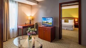 Suite, 1 King Bed | In-room safe, desk, iron/ironing board, WiFi (free)
