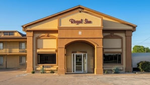 A building with a sign reading 'Regal Inn.'