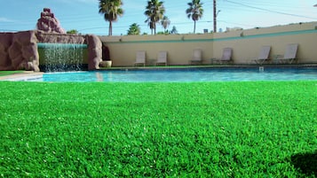 Outdoor pool, pool umbrellas, sun loungers