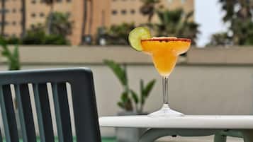 Breakfast, lunch served; international cuisine, pool views