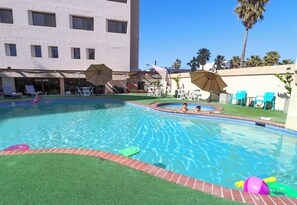 Outdoor pool, pool umbrellas, pool loungers