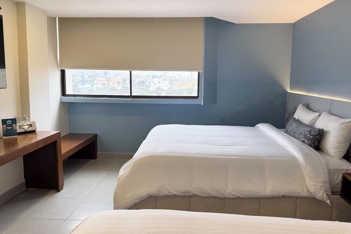 Comfort Room, 2 Queen Beds | Hypo-allergenic bedding available, desk, blackout drapes