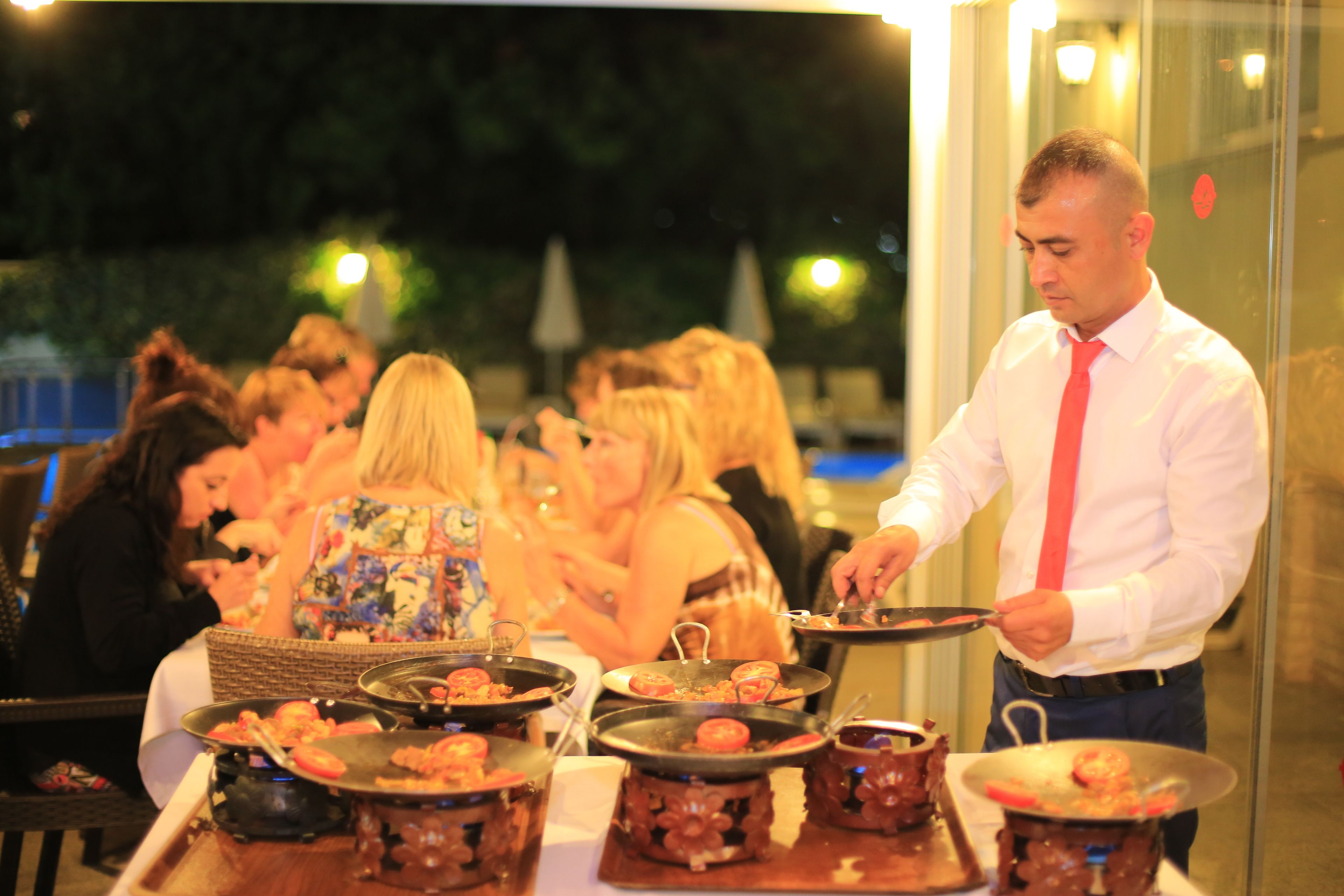 Breakfast, lunch, dinner served; Italian cuisine, pool views 