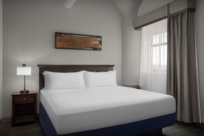 Desk, laptop workspace, blackout drapes, iron/ironing board