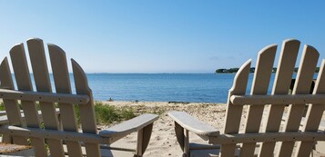 On the beach, sun loungers, beach umbrellas, beach towels