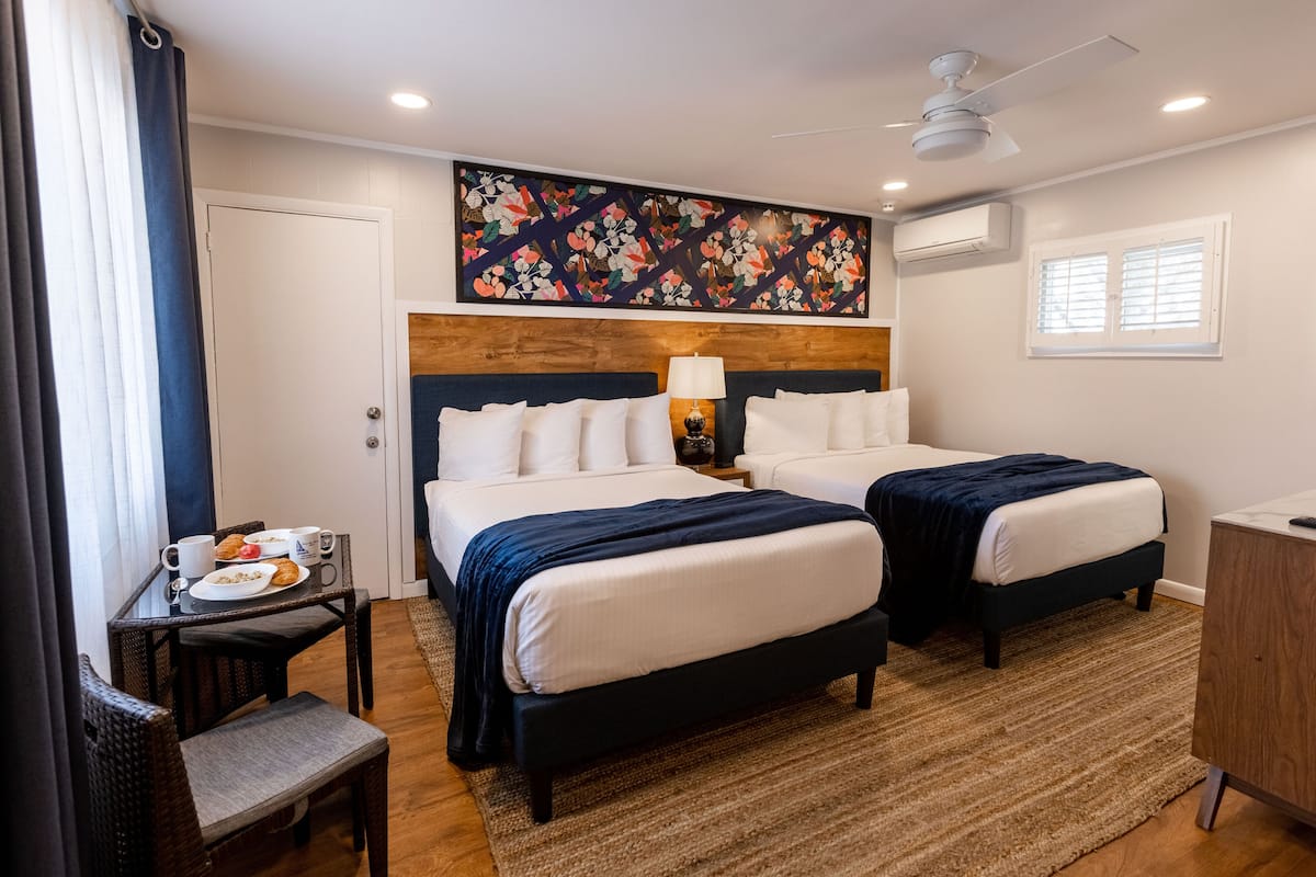 Room, 2 Double Beds, Kitchenette | 2 bedrooms, individually furnished, laptop workspace, blackout drapes