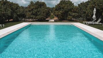 Outdoor pool, open 8 AM to 8 PM, pool umbrellas, sun loungers