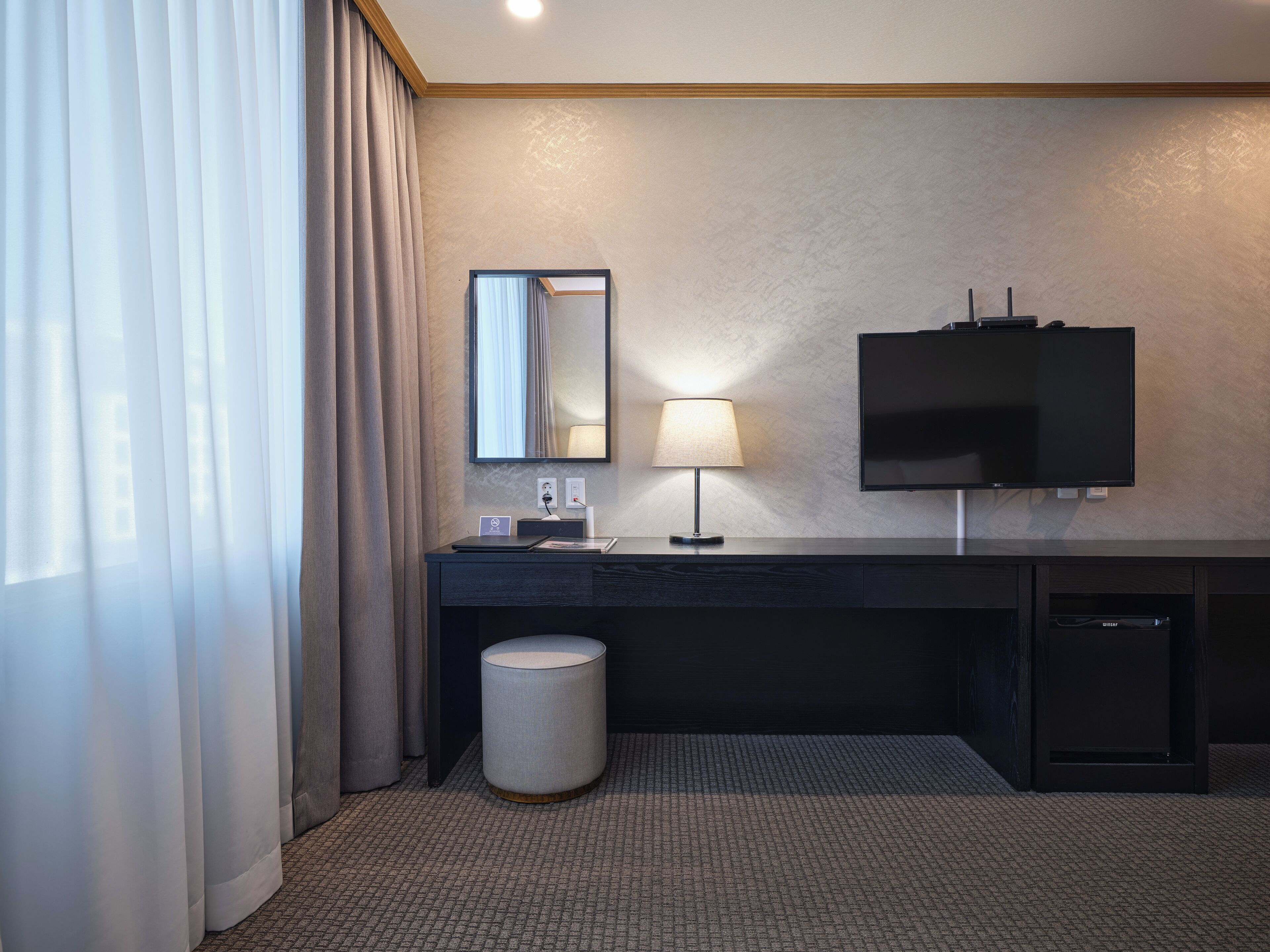 Premium bedding, down duvets, memory-foam beds, in-room safe