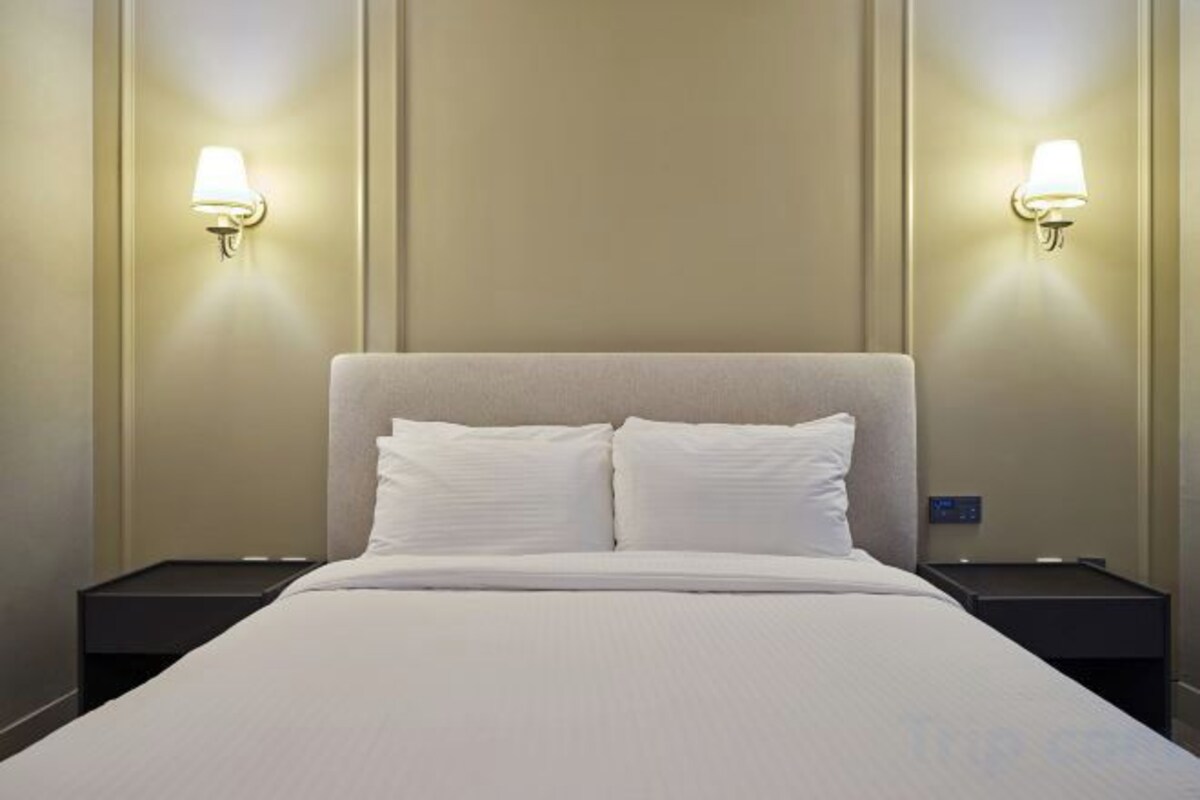 Premium bedding, down duvets, memory-foam beds, in-room safe