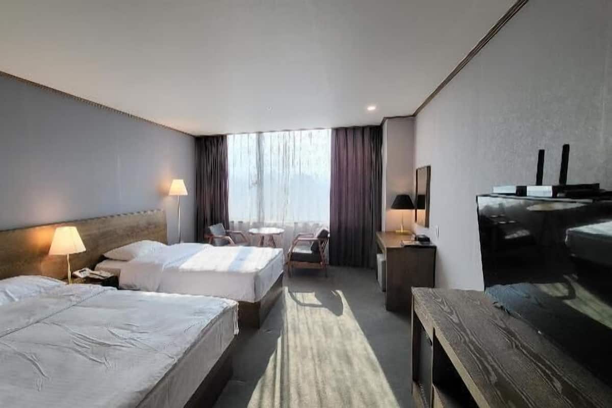 Premium bedding, down comforters, memory foam beds, in-room safe