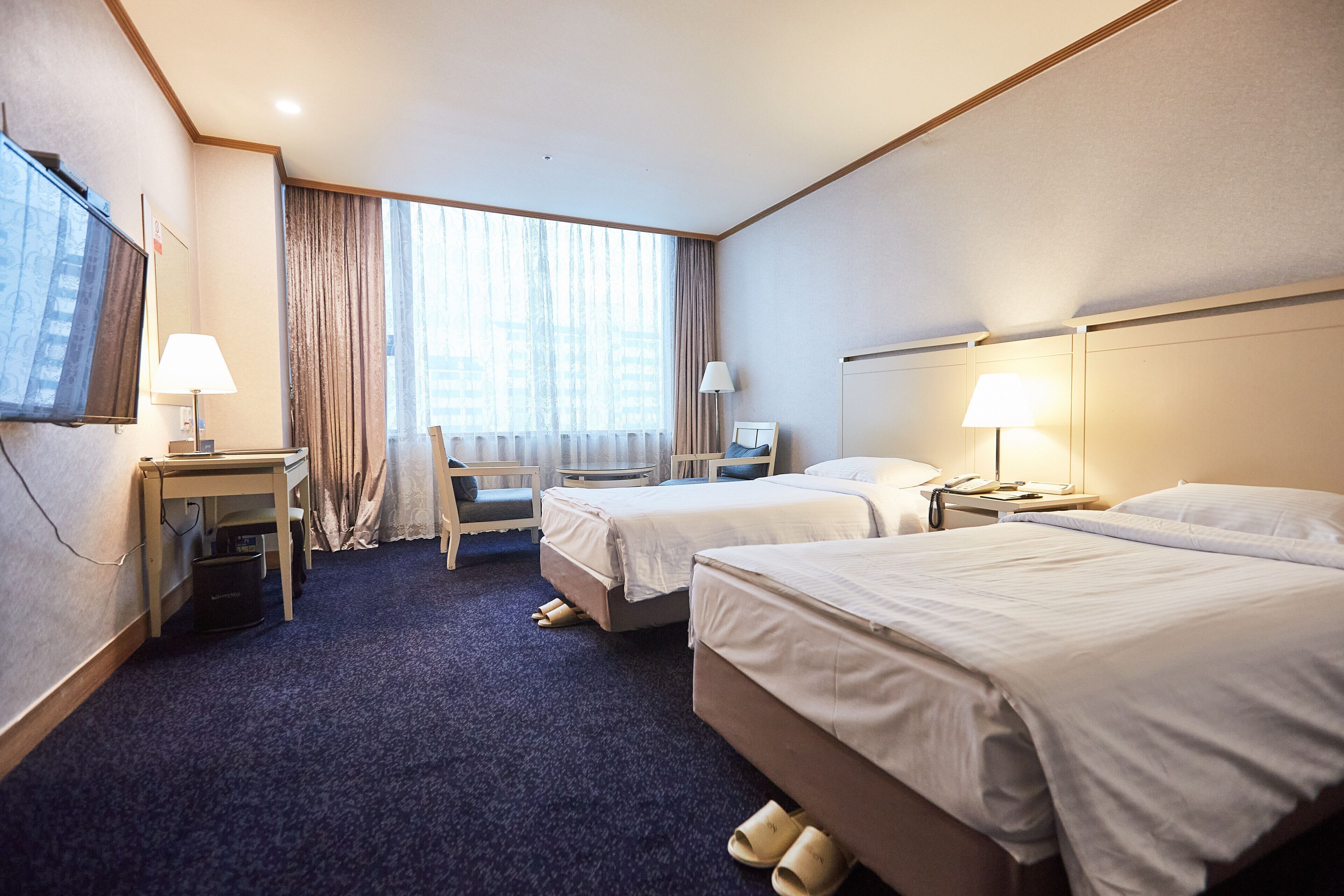 Premium bedding, down comforters, memory foam beds, in-room safe