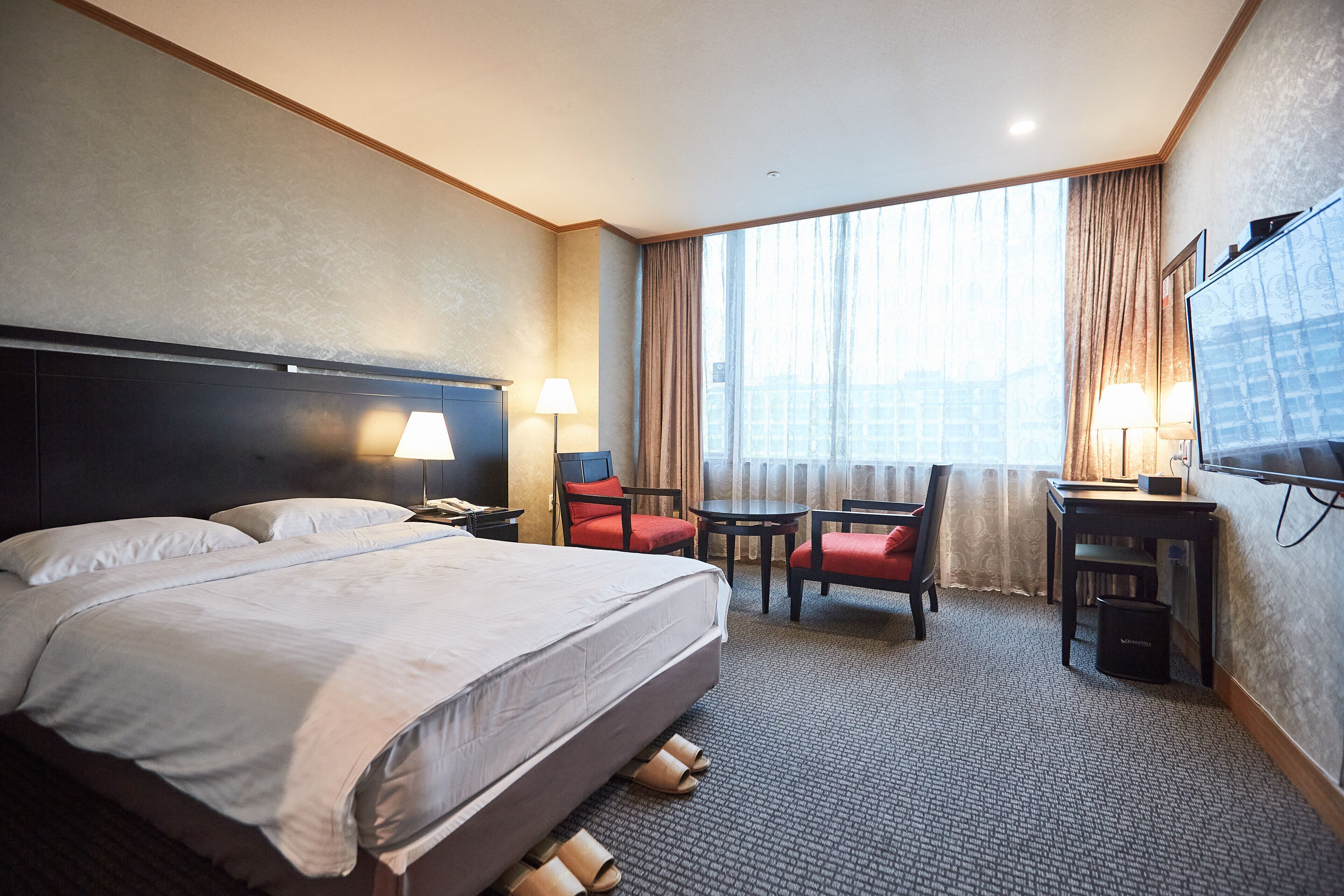 Premium bedding, down comforters, memory foam beds, in-room safe