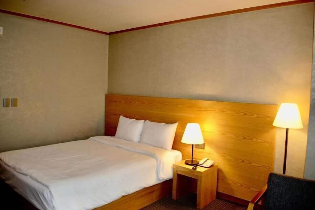Premium bedding, down duvets, memory-foam beds, in-room safe