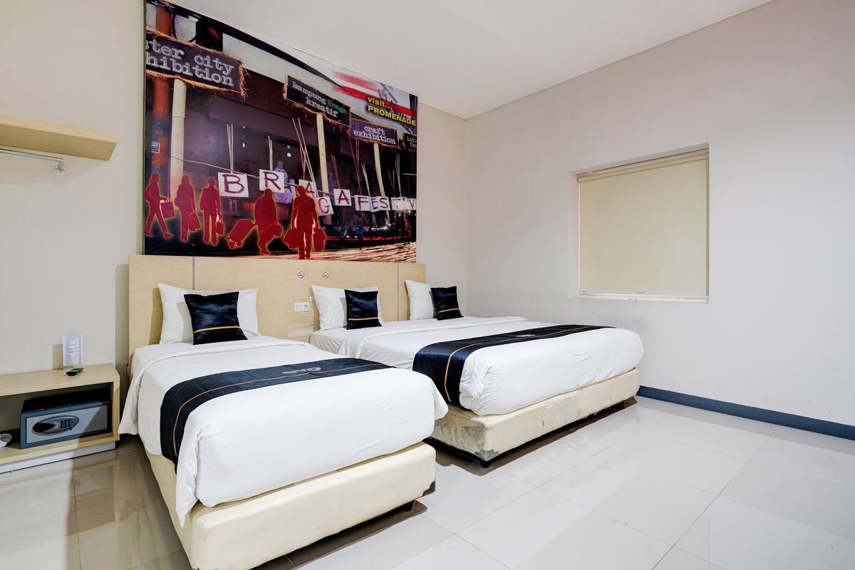 Suite Keluarga | Kamar mandi | Shower, perlengkapan mandi gratis, sandal, dan kloset