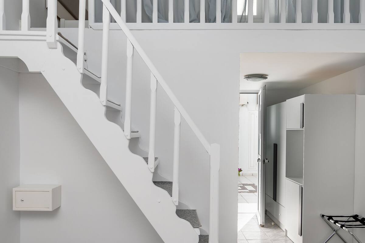 Appartement Duplex | Coffres-forts dans les chambres, rideaux occultants