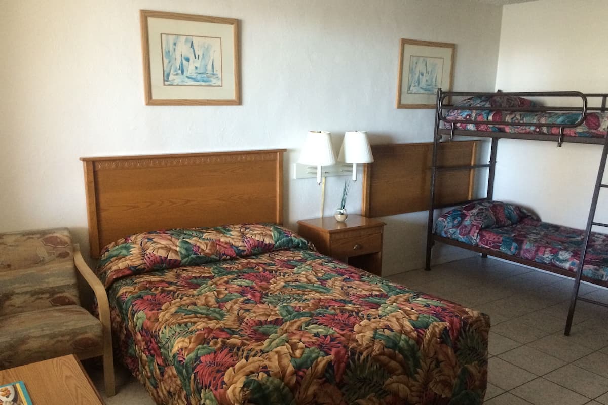 Standard Room, 1 Double and 1 Bunk Bed, Non Smoking | Laptop workspace, bed sheets