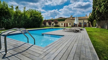 Outdoor pool, pool umbrellas, pool loungers