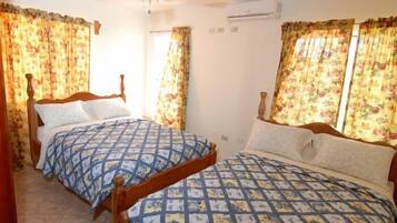 Deluxe Apartment, 2 Double Beds, Ensuite, Garden View | 1 bedroom, in-room safe, soundproofing, iron/ironing board