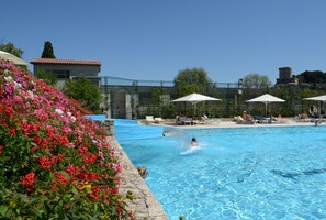 2 outdoor pools, pool umbrellas, pool loungers