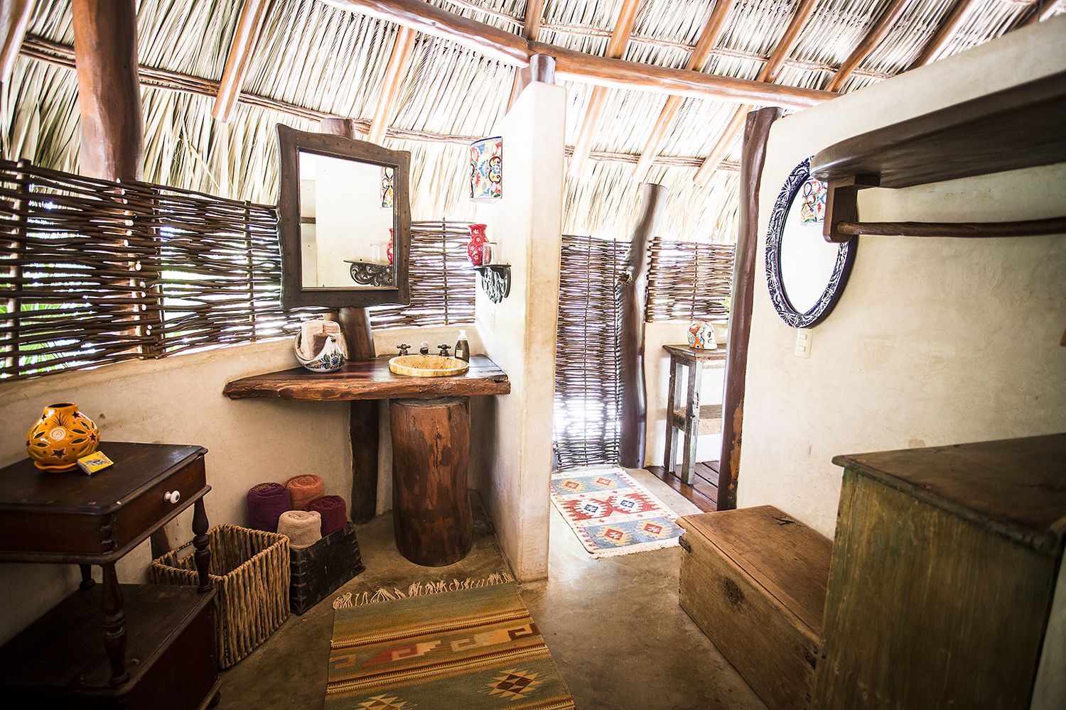 deluxe bungalow | bathroom | shower, rainfall showerhead, hair dryer, towels