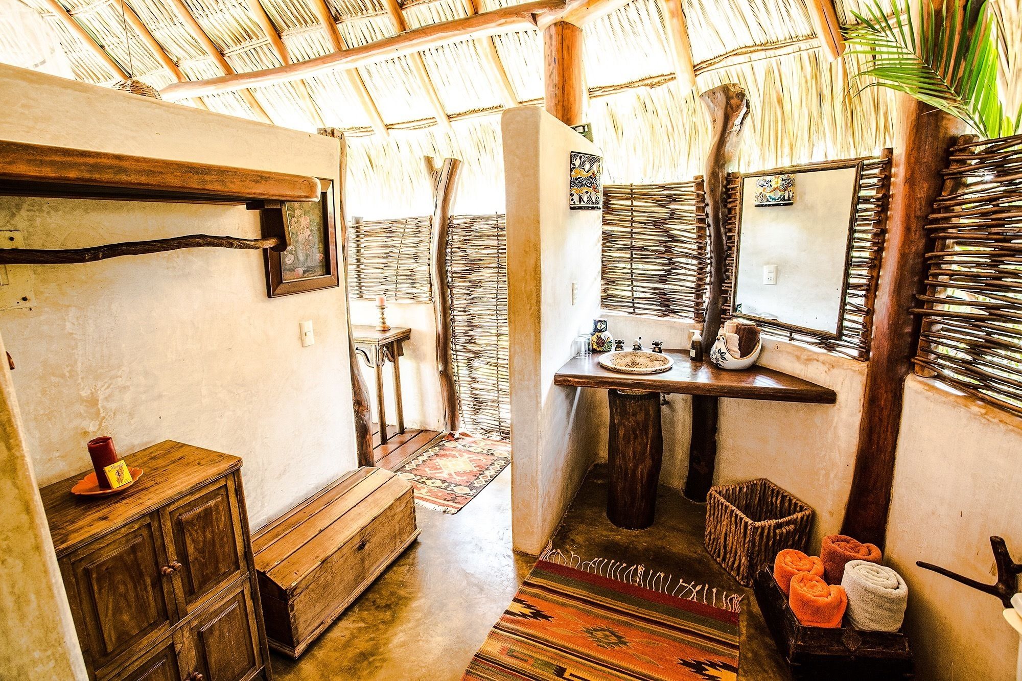 deluxe bungalow | bathroom | shower, rainfall showerhead, hair dryer, towels