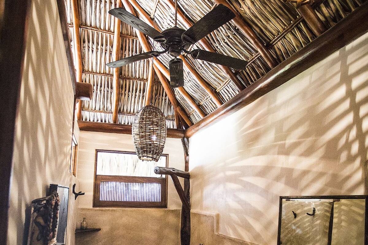 air-conditioned suite | bathroom | shower, rainfall showerhead, hair dryer, towels