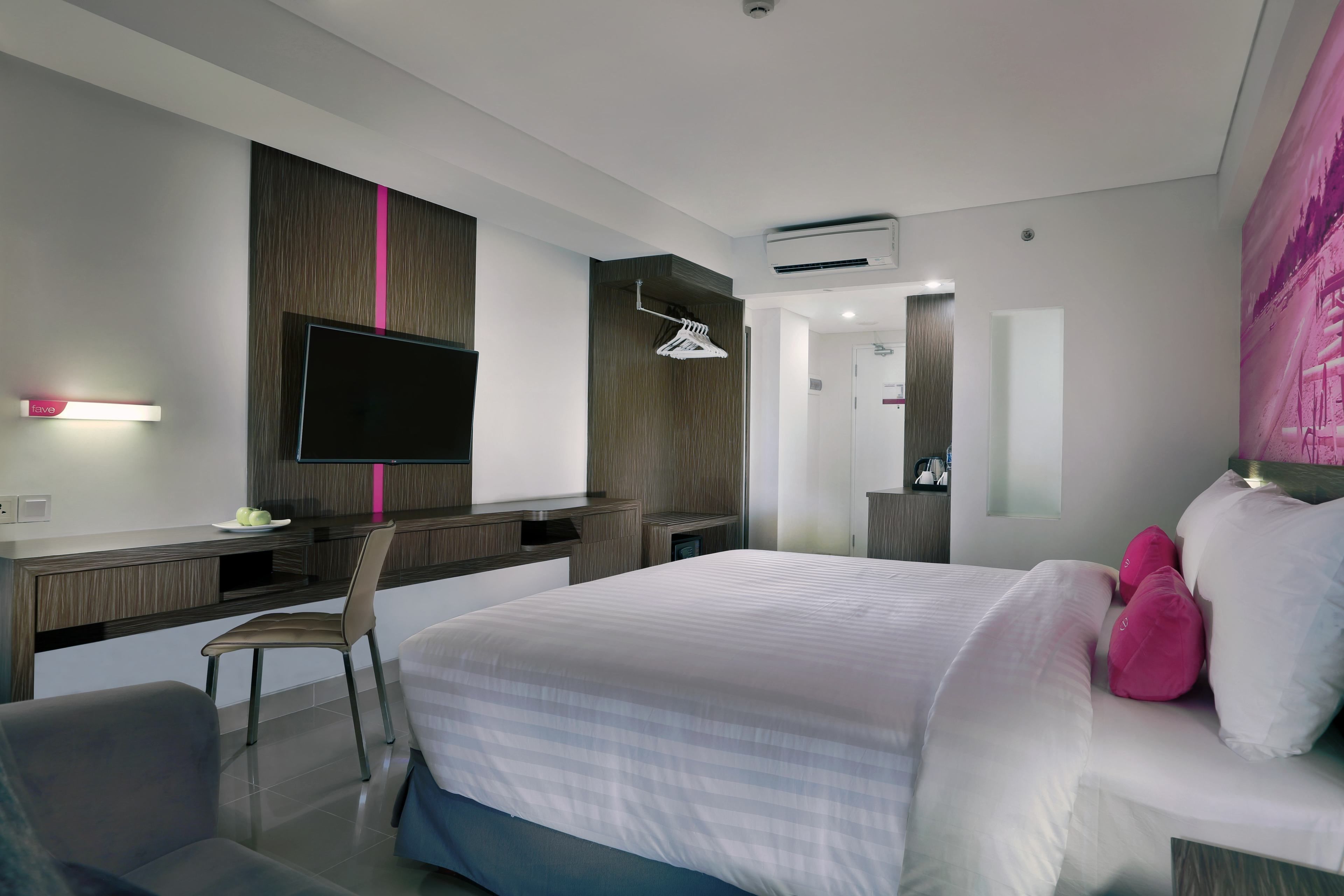 junior suite | in-room safe, desk, laptop workspace, blackout curtains