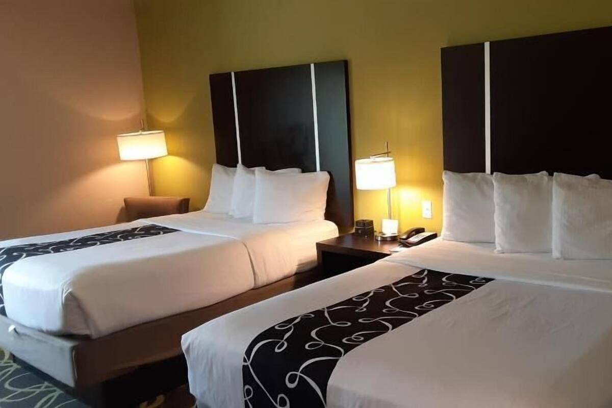 Premium bedding, desk, blackout drapes, soundproofing