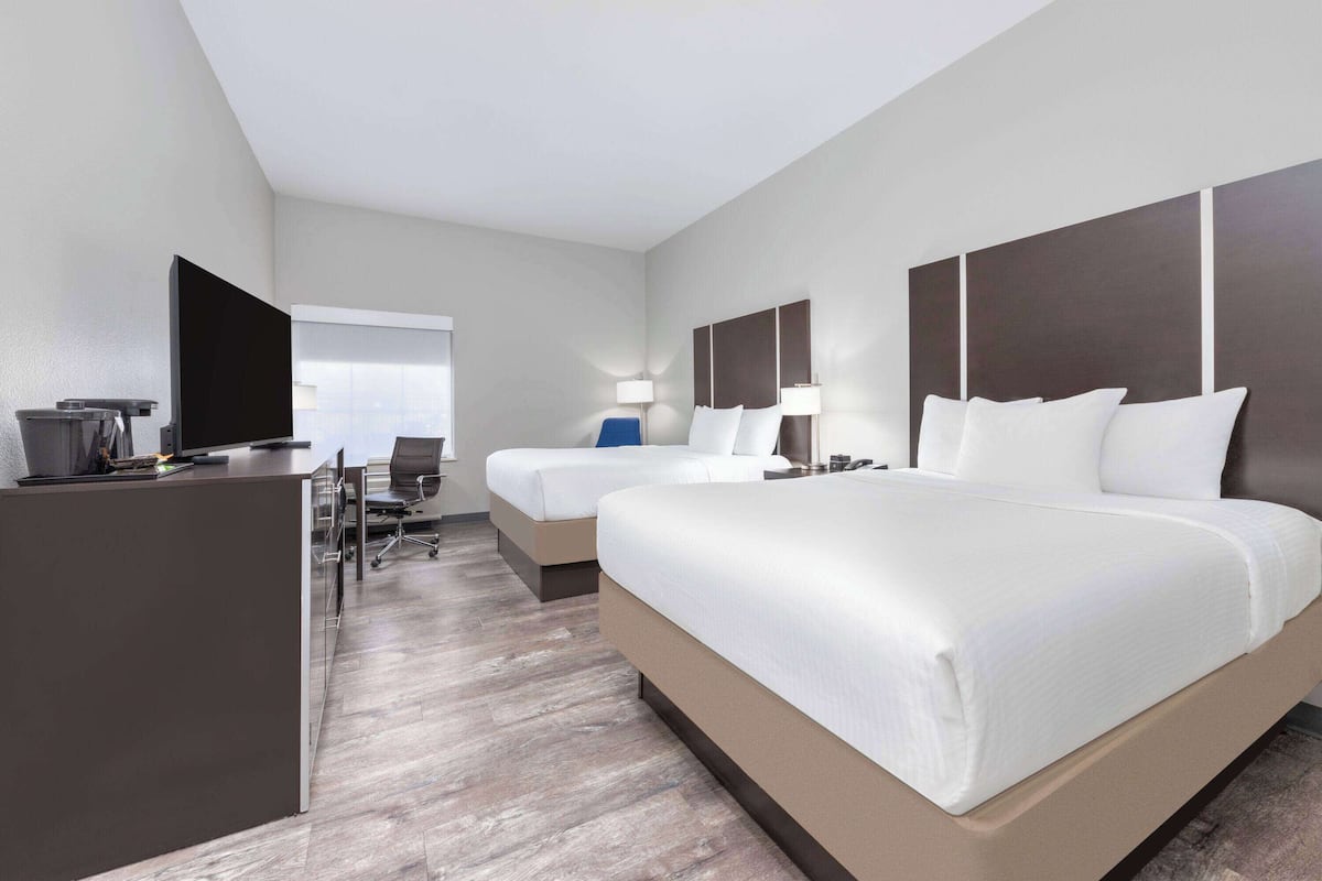 Premium bedding, desk, blackout curtains, soundproofing