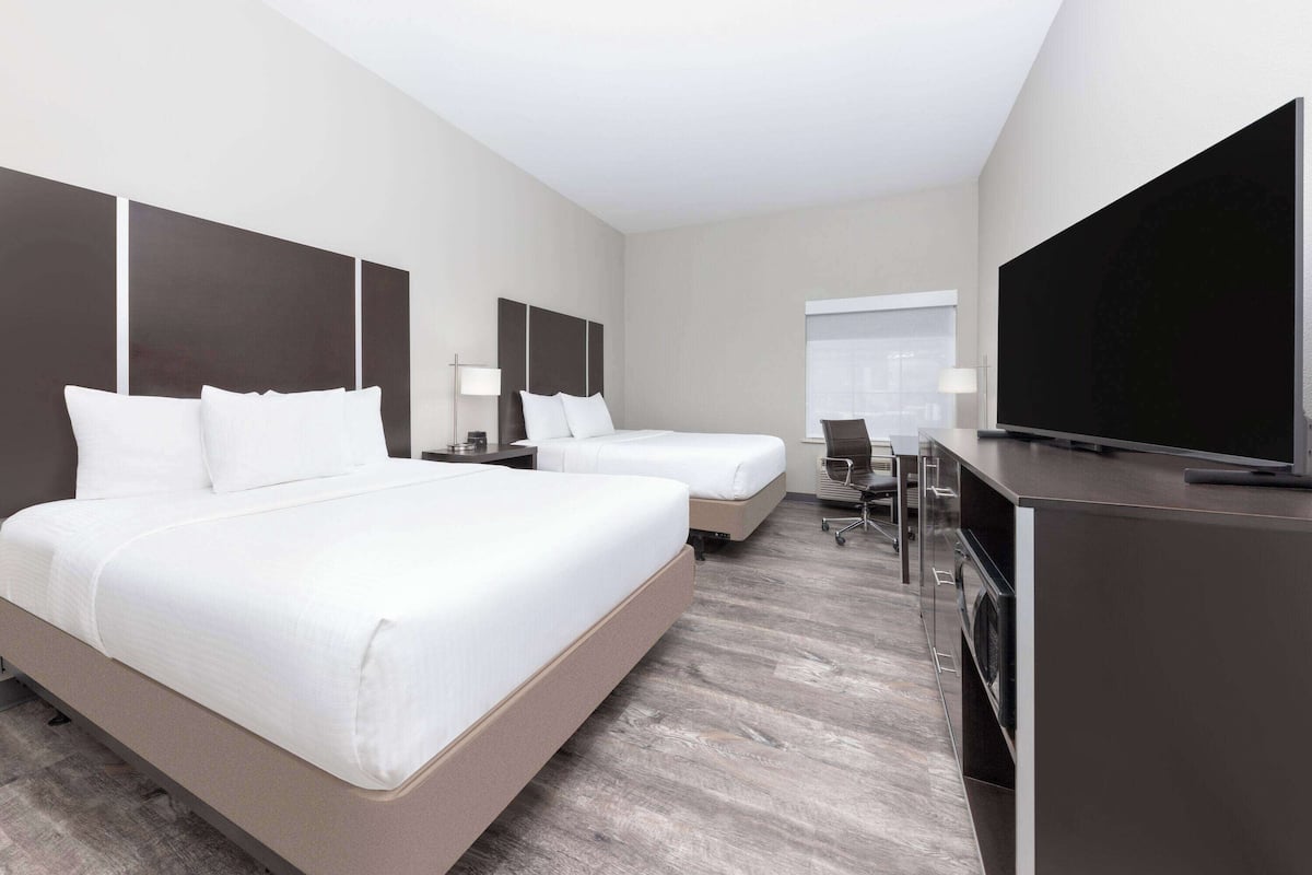 Premium bedding, desk, blackout curtains, soundproofing