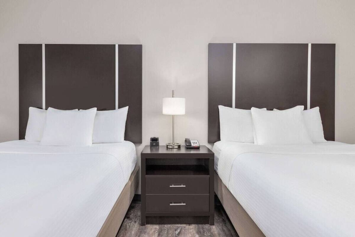 Premium bedding, desk, blackout drapes, soundproofing