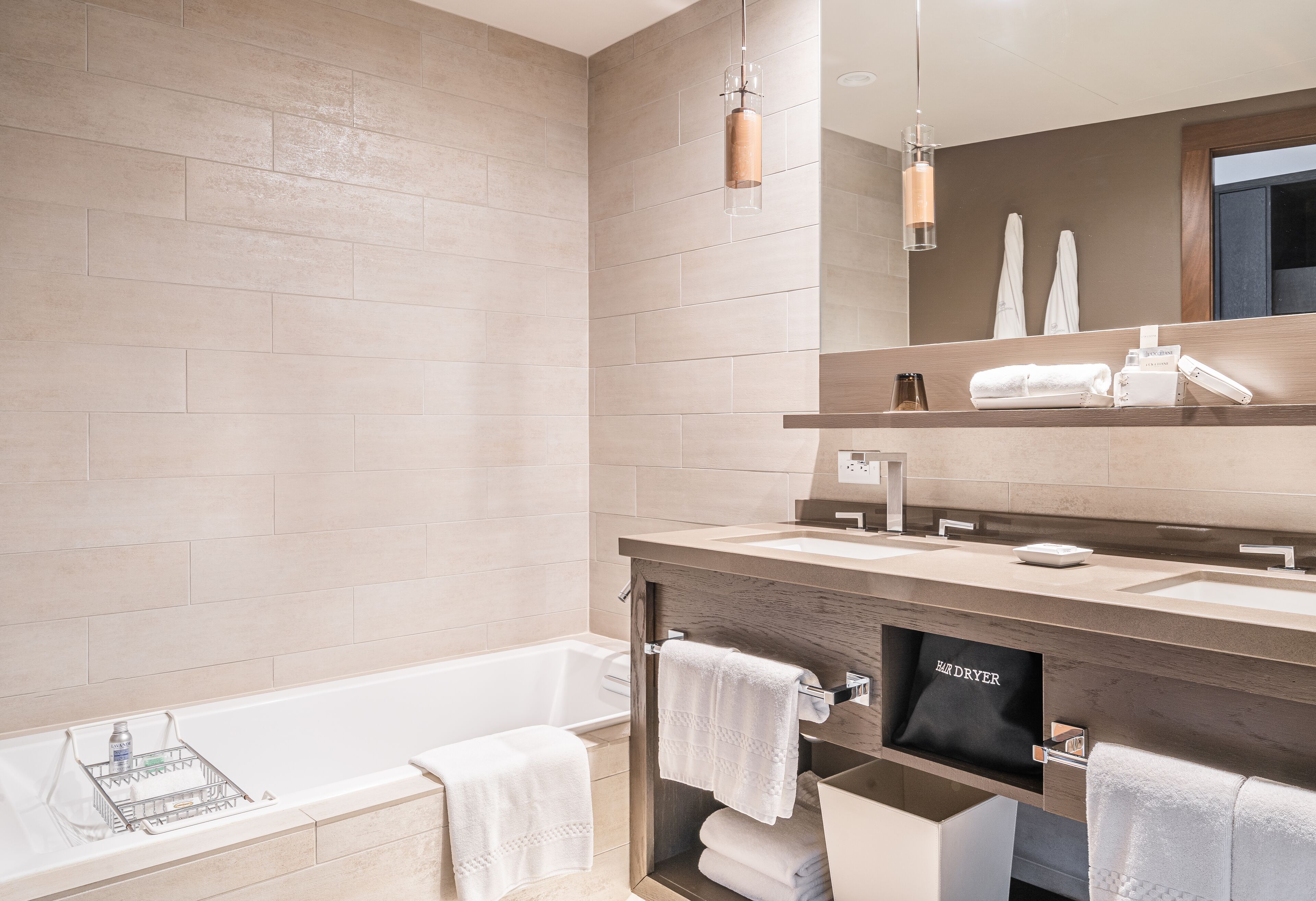 designer toiletries, hair dryer, bathrobes, slippers